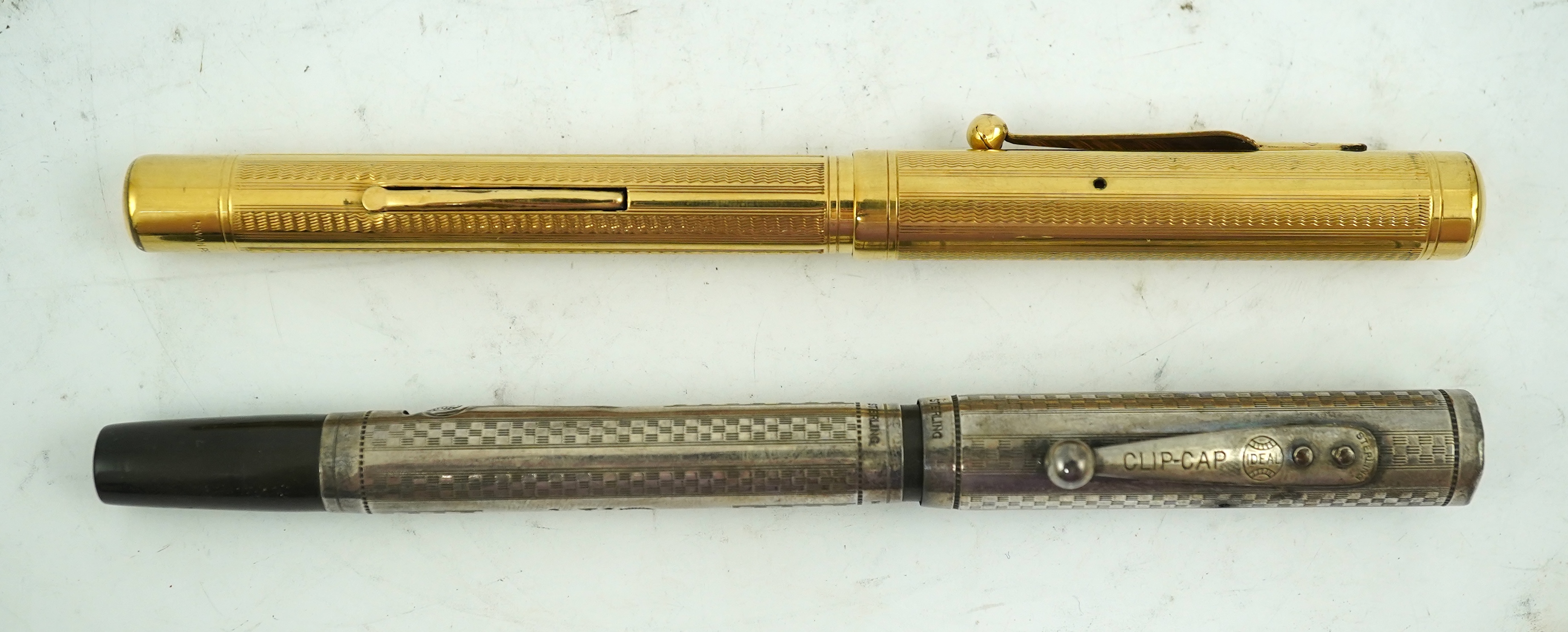 A Swan lever fill fountain pen and a sterling silver Waterman